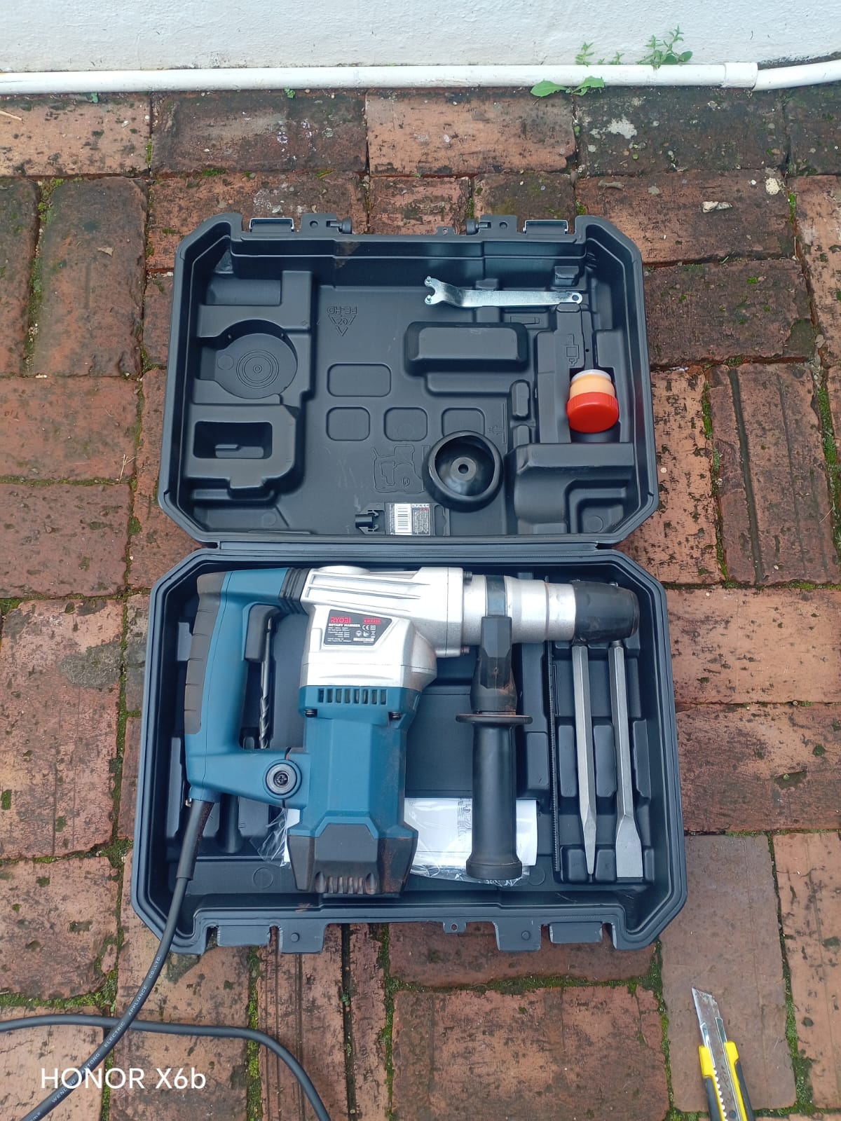 Accredited technician mounting a satellite dish bracket