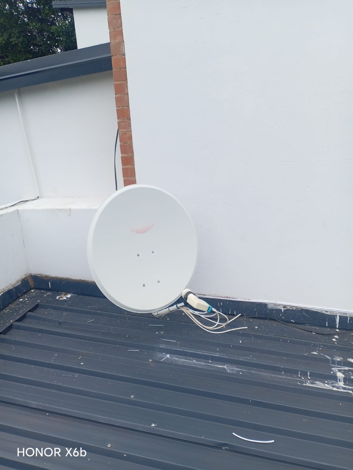 DStv dish installation on a Constantia estate home