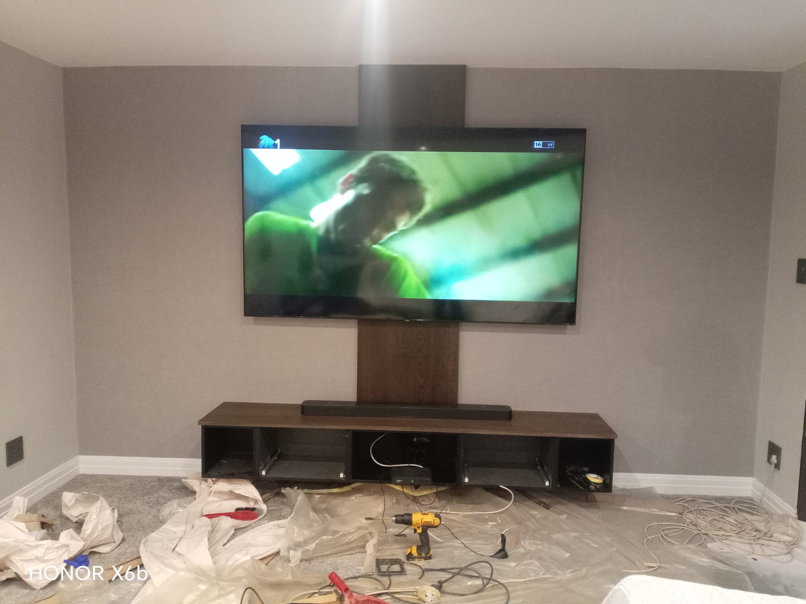 Technician aligning a satellite dish in Constantia