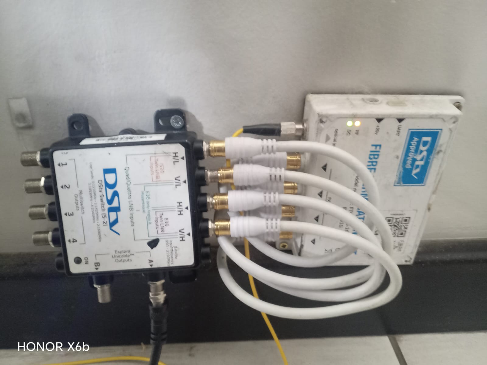 DStv technician working on a coastal Table View property